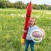 Girl-holding-red-rocket
