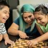 Kids-and-mom-playing-chess