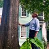 Jeffery Robinson, Seattle attorney and activist, stands next to a tree in a scene from the new film Who We Are: A Chronicle of Racism in America