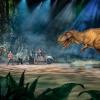 Scene from the dinosaur show called Jurassic World Live Tour with T. rex facing human