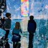 Kids interact with digital art elements at the newly opened WNDR Seattle Museum