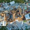 Shot from above of a house smashed by a storm
