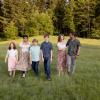 Blended North Bend family walks together at a Pacific Northwest park