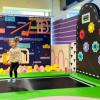 little kid jumping on trampoline during an indoor birthday party near Seattle