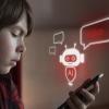 child looking at a phone using an AI chatbot