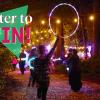 "Enter to Win!" text over Wintertide festival of lights