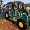 A child at a farm themed playground near Seattle on a sunny weekend