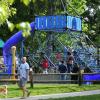 families on staycation in Redmond playing on the playground at Grass Lawn Park