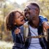 A boy and a dad hiking on a sunny day helps them connect and bond