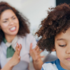 angry and mom scolding child for behavior problem