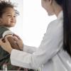 child receiving a measles vaccine