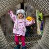 little girl playing in the nets