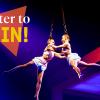 "Enter to Win" text over acrobatic performers