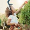 girl finding an Easter egg outside
