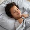 boy sleeping in bedroom