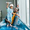 dad at an airport with his son