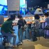 families building with Lego bricks at the 'Artemis Adventure with Lego Bricks'