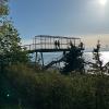 scenic view of the water with a footbridge to it at Carkeek Park