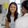 teenager at a doctor visit without her parents