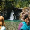kids watching a waterfall near Seattle on a family-friendly hike