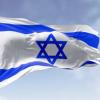 the national flag of Israel waving in the wind