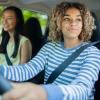 teen girls driving in a car