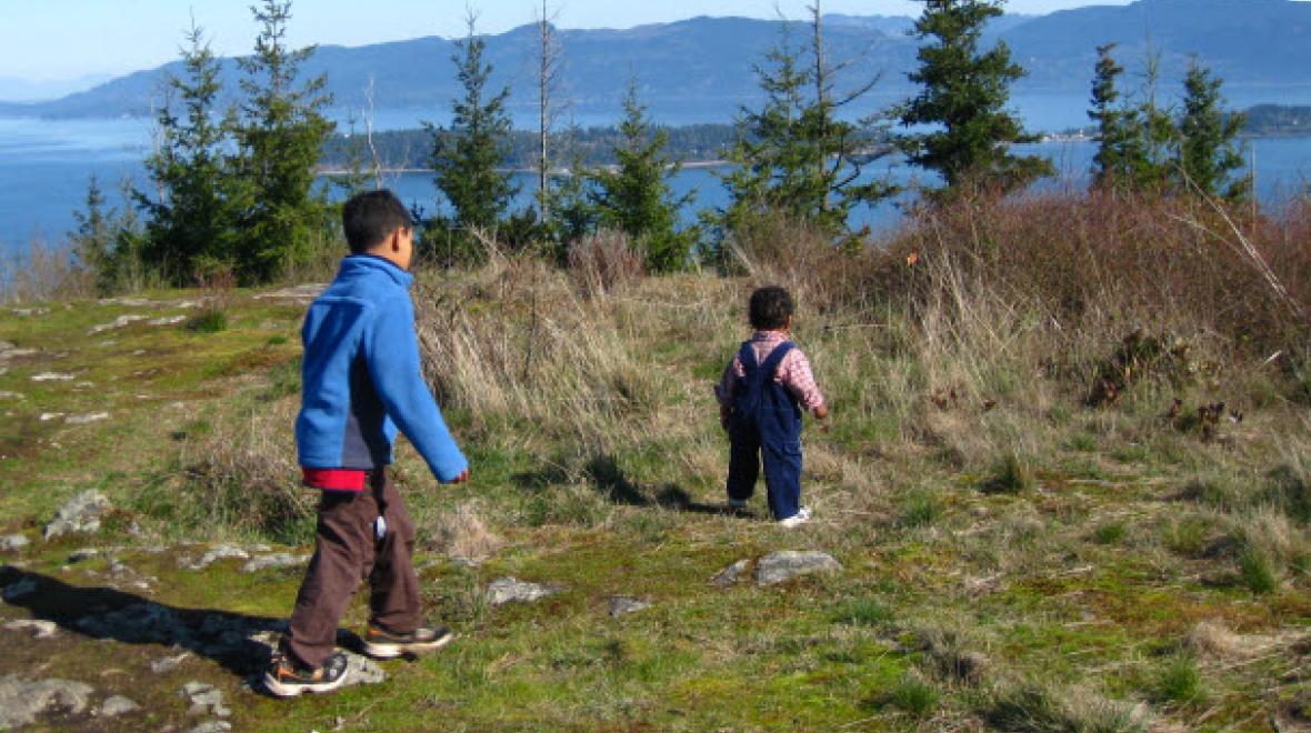 Kids hiking on top of Guemes mountain on Guemes Island kid-friendly hikes for Seattle families