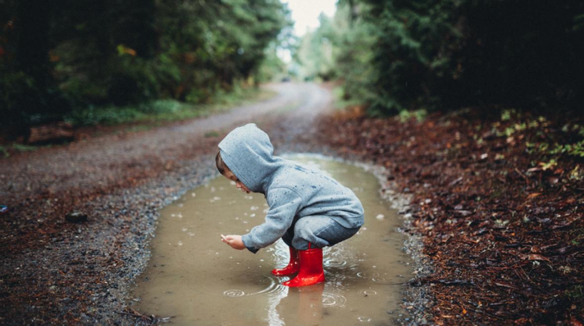 Kid in puddle