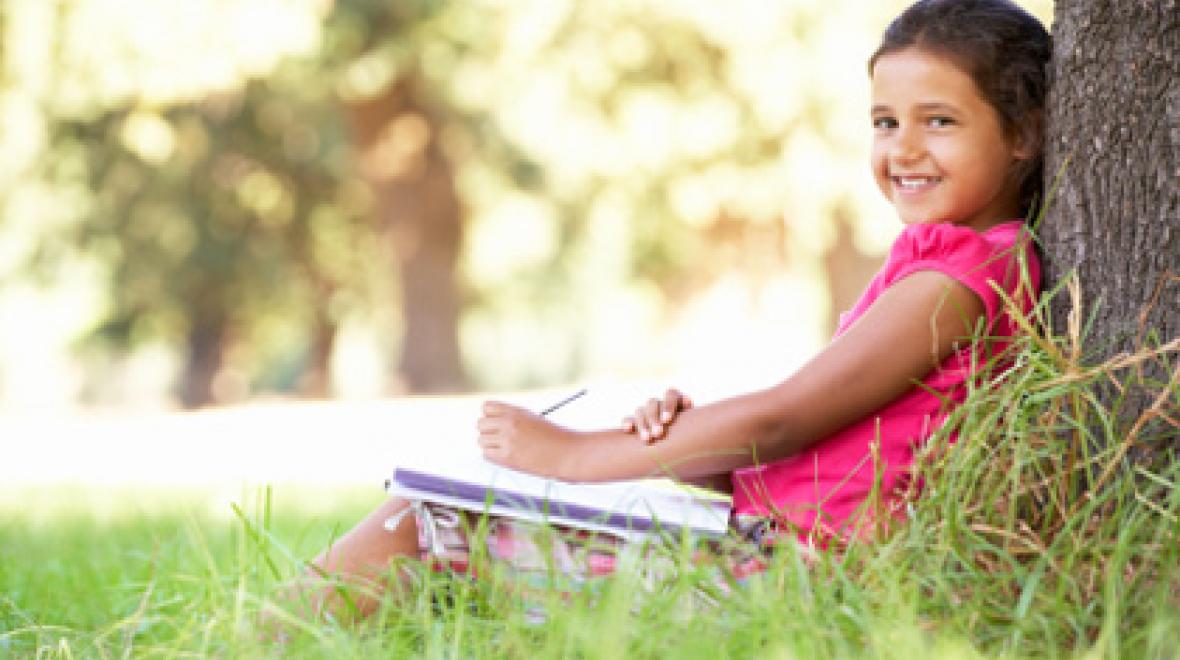 Girl reading outside