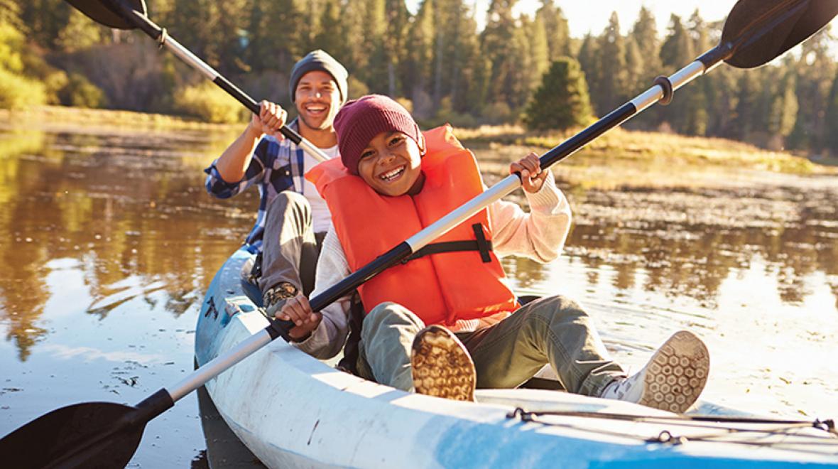 father and son kayaking