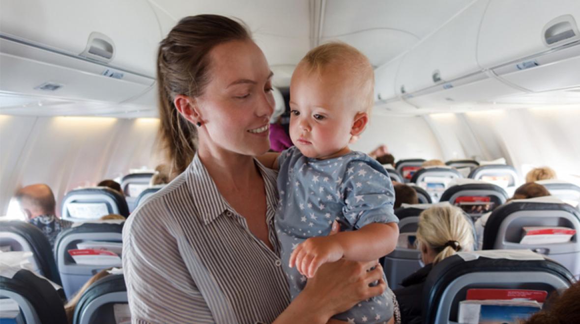 mother and baby on plane