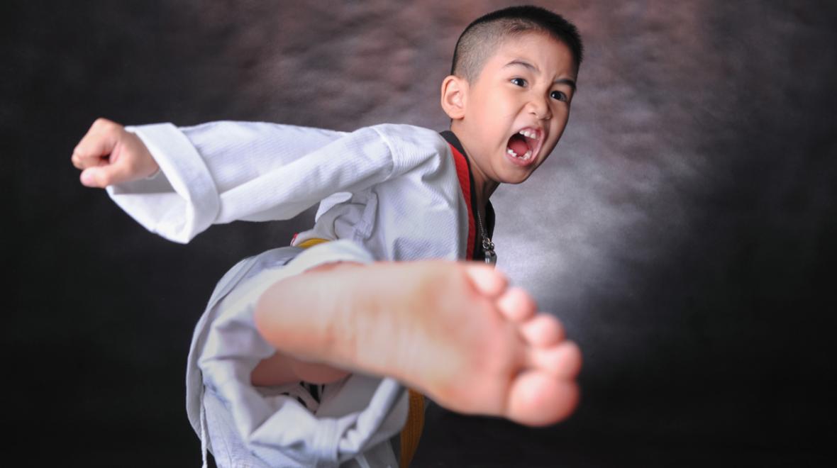 boy doint martial arts karate virtual extracurricular activities from home