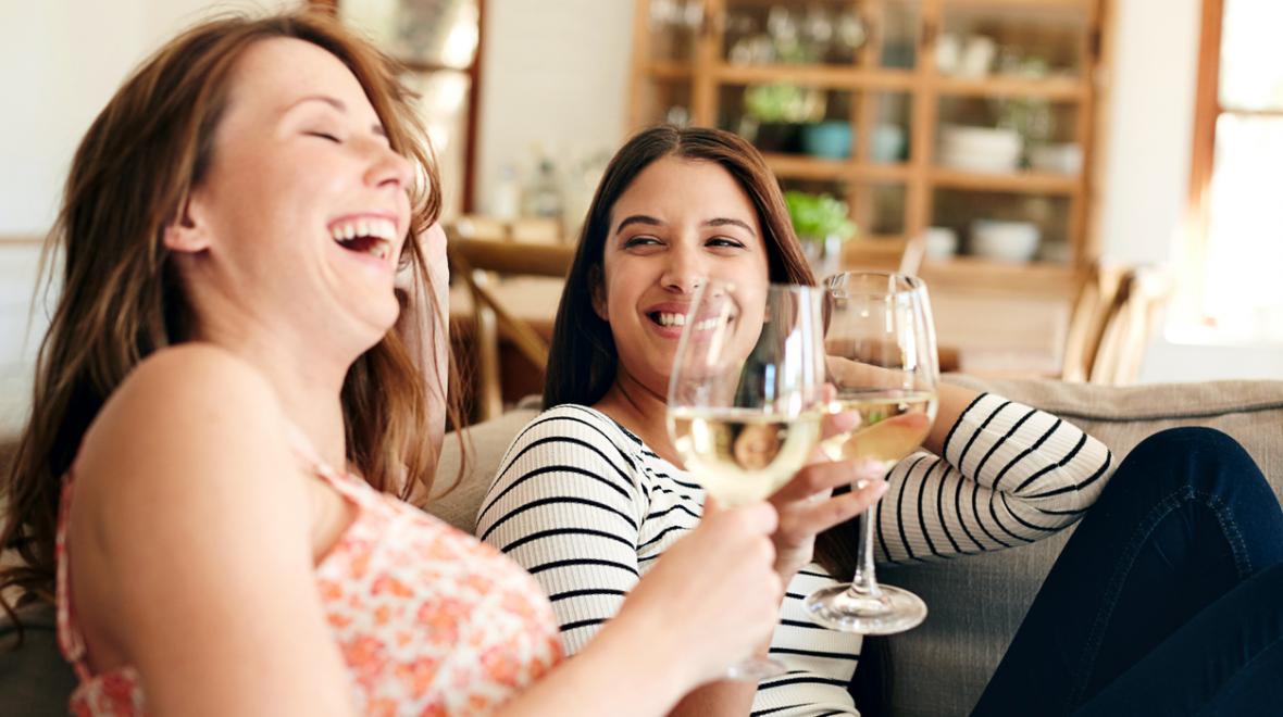 Women-drinking-wine-laughing-great-mom-retreats-getaways-seattle-northwest-girlfriend-getaways