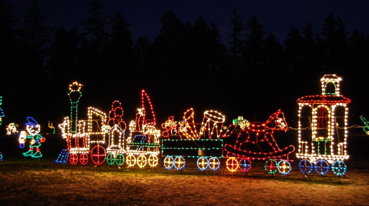 Fantasy Light drive-through holiday light display lighted train in Spanaway Park