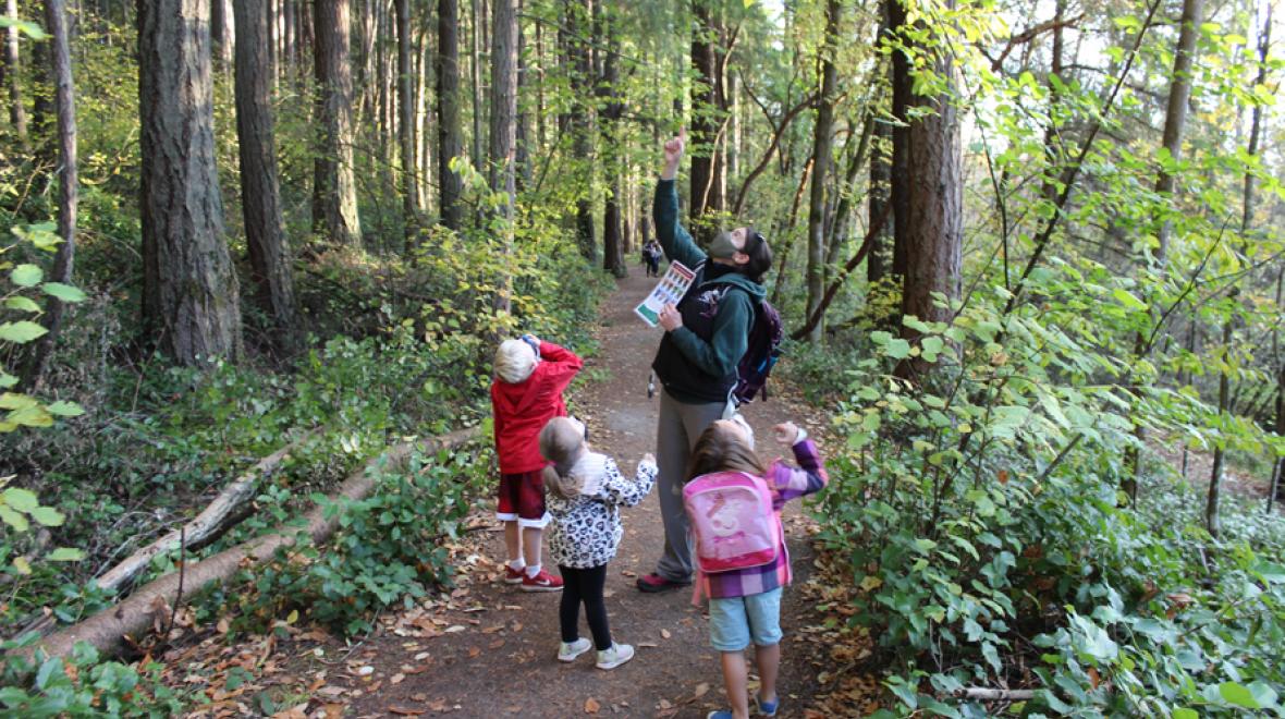 kids on the trail with a nature guide