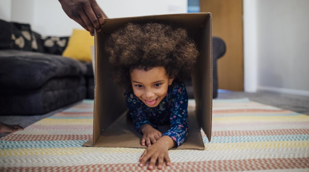 kid-moving-through-cardboard-box