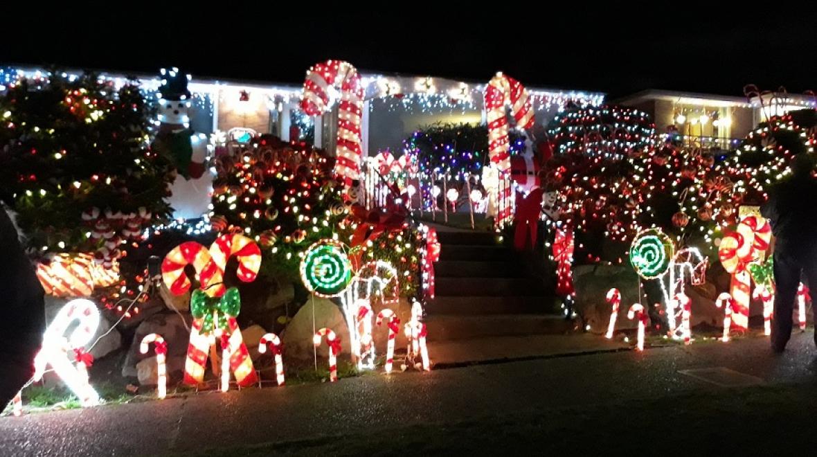A house in Seattle’s Olympic Manor neighborhood, just north of Ballard, is decorated in holiday lights