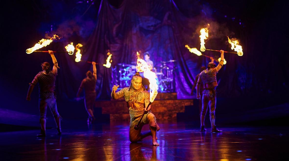Fire knife dance performer in action at Cirque du Soleil's Alegría currently showing in Redmond, Washington, near Seattle