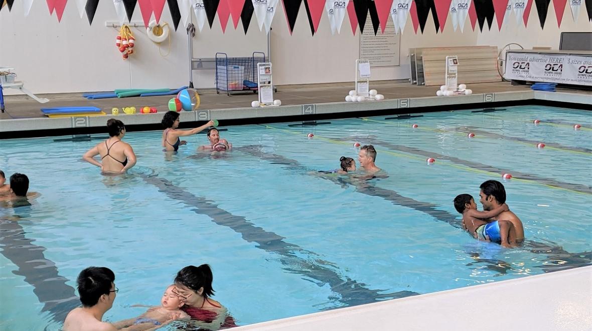 View of parents and children during parent-and-me swim lessons at mary wayte pool on mercer island