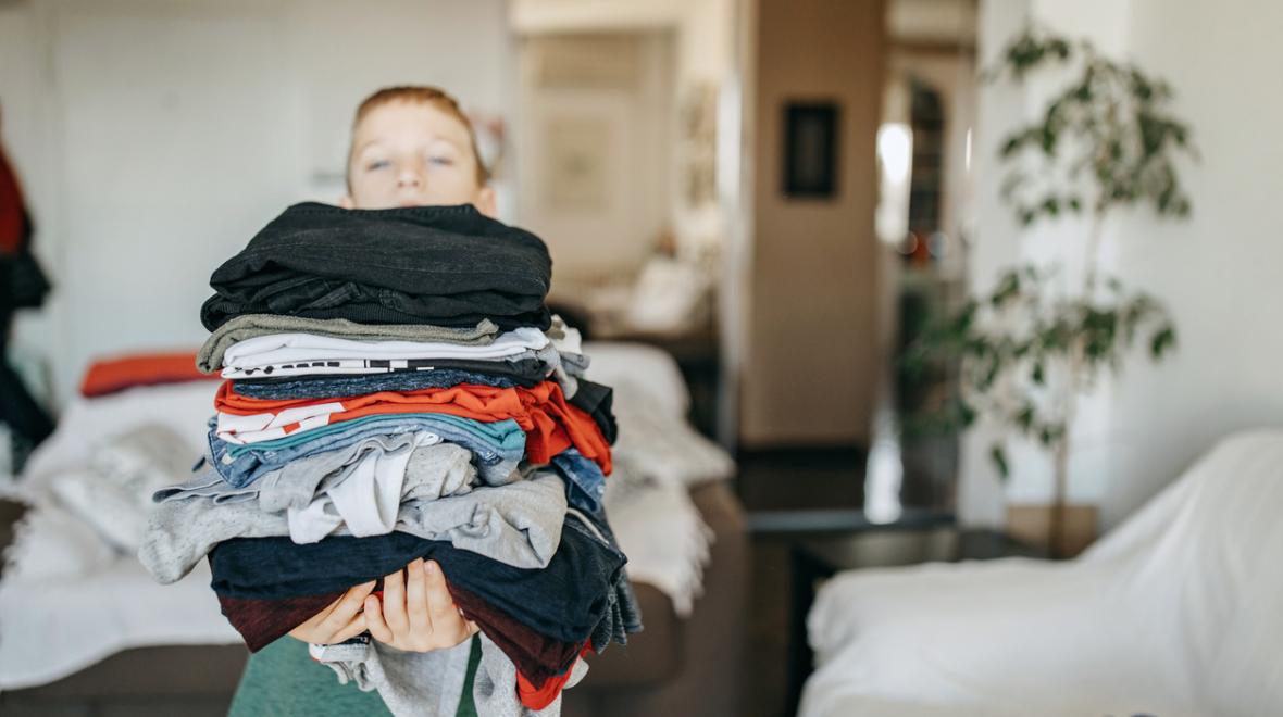 Kid-with-folded-laundry