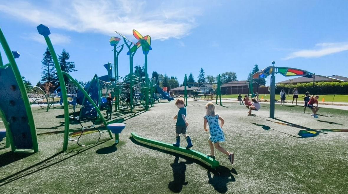 Kids play on the new playground at Emma Yule Park in Everett fun places to play near Seattle