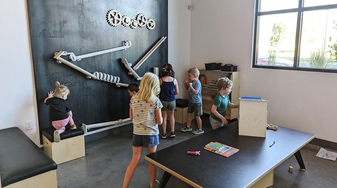 Children play in the kids’ play area at Uprise Brewing, a family-friendly brewery in Spokane, destination for Seattle families