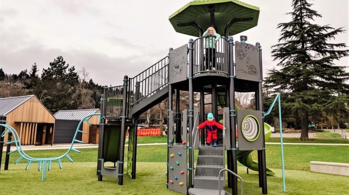 Two kids playing on a tall town at Junita Beach Park