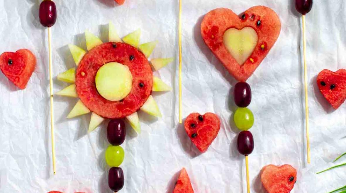 Fresh fruit cut into shapes on popsicle sticks are a summer dessert recipe kids will want to eat