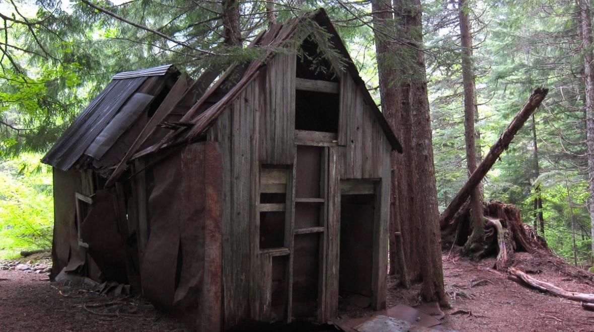 Ghost town hikes near Seattle include the Monte Cristo townsite and an abandoned cabin hikers can see along the trail