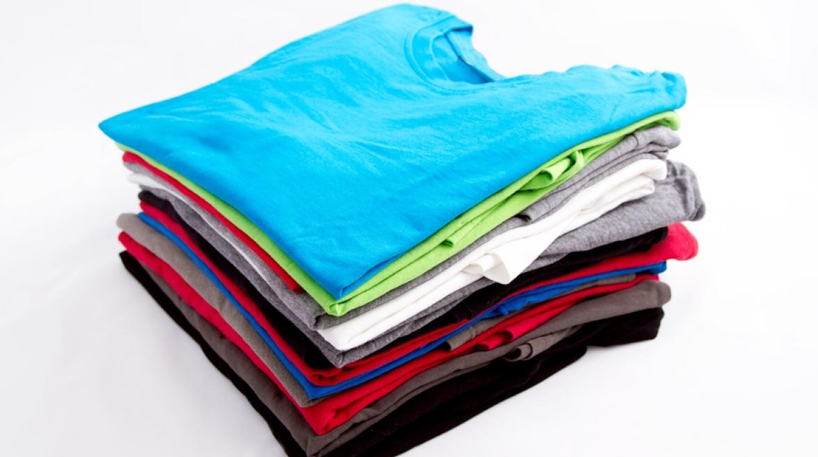 defrosting a frozen stack of colorful t-shirts is one water activity kids love
