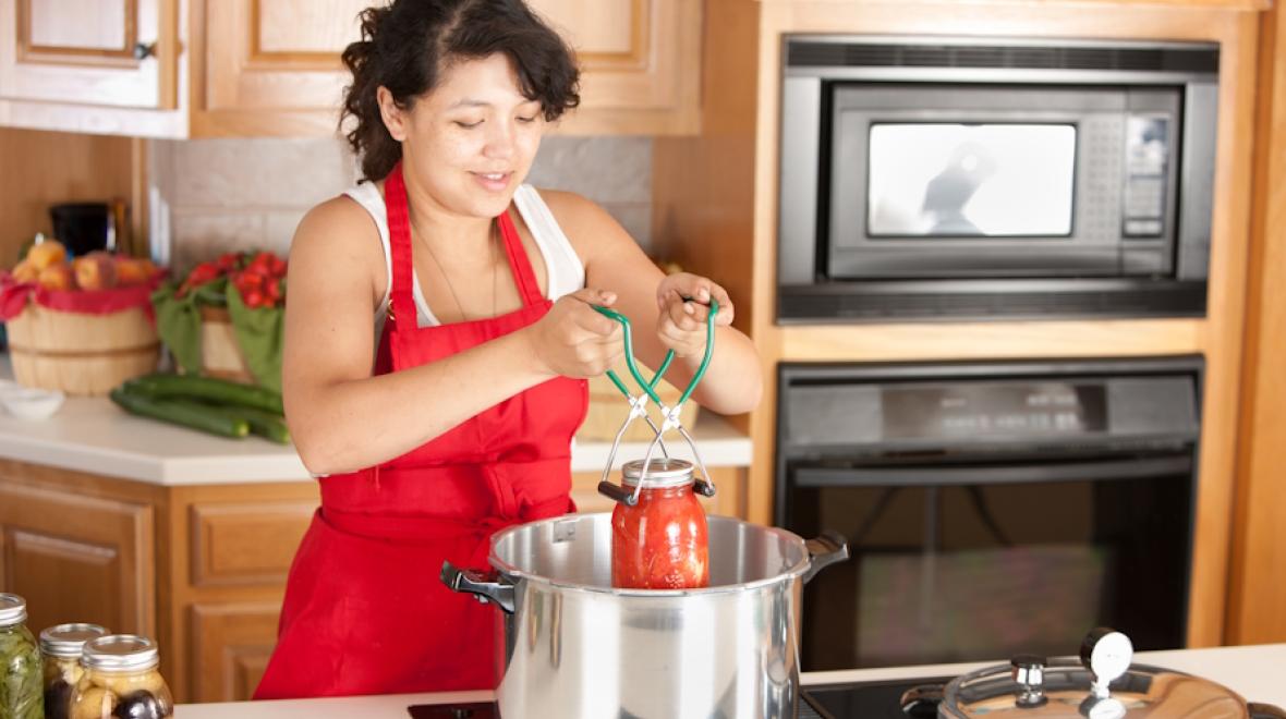 woman canning and using quick pickling tips