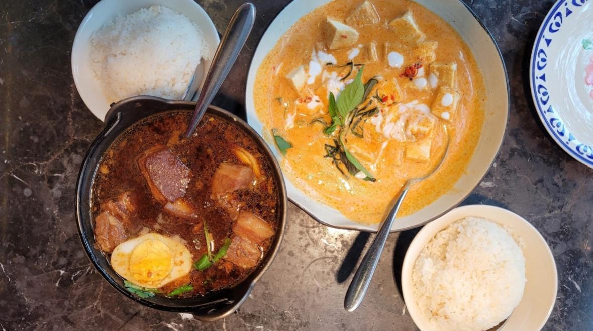 Best Asian restaurants in Seattle include Thai Isarn serving authentic dishes such as Phuket Pork Belly Stew and Chi Chu Red Curry