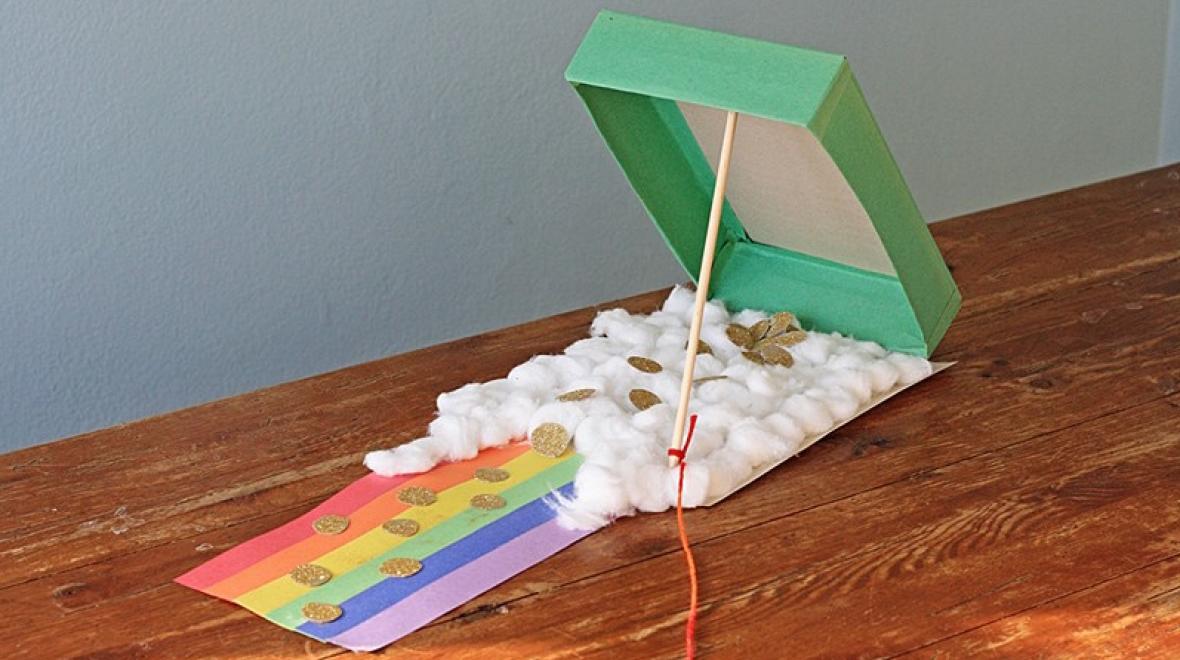 A Leprechaun trap made with a cardboard box and cotton balls, St. Patrick's day crafts for kids