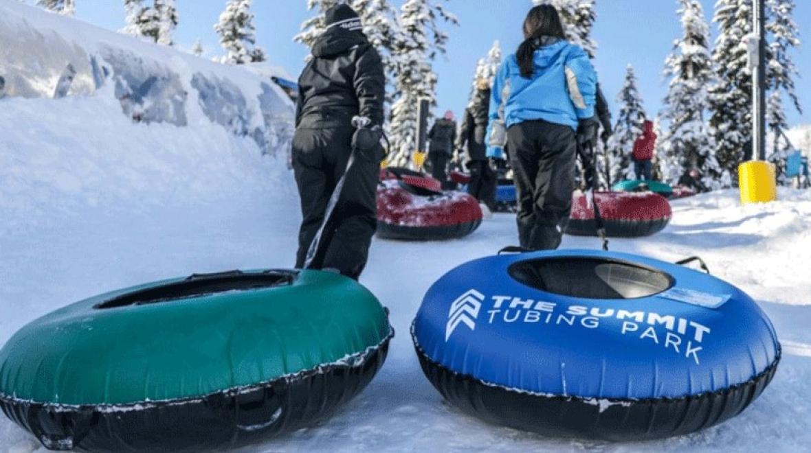 Families tubing during winter break in Seattle